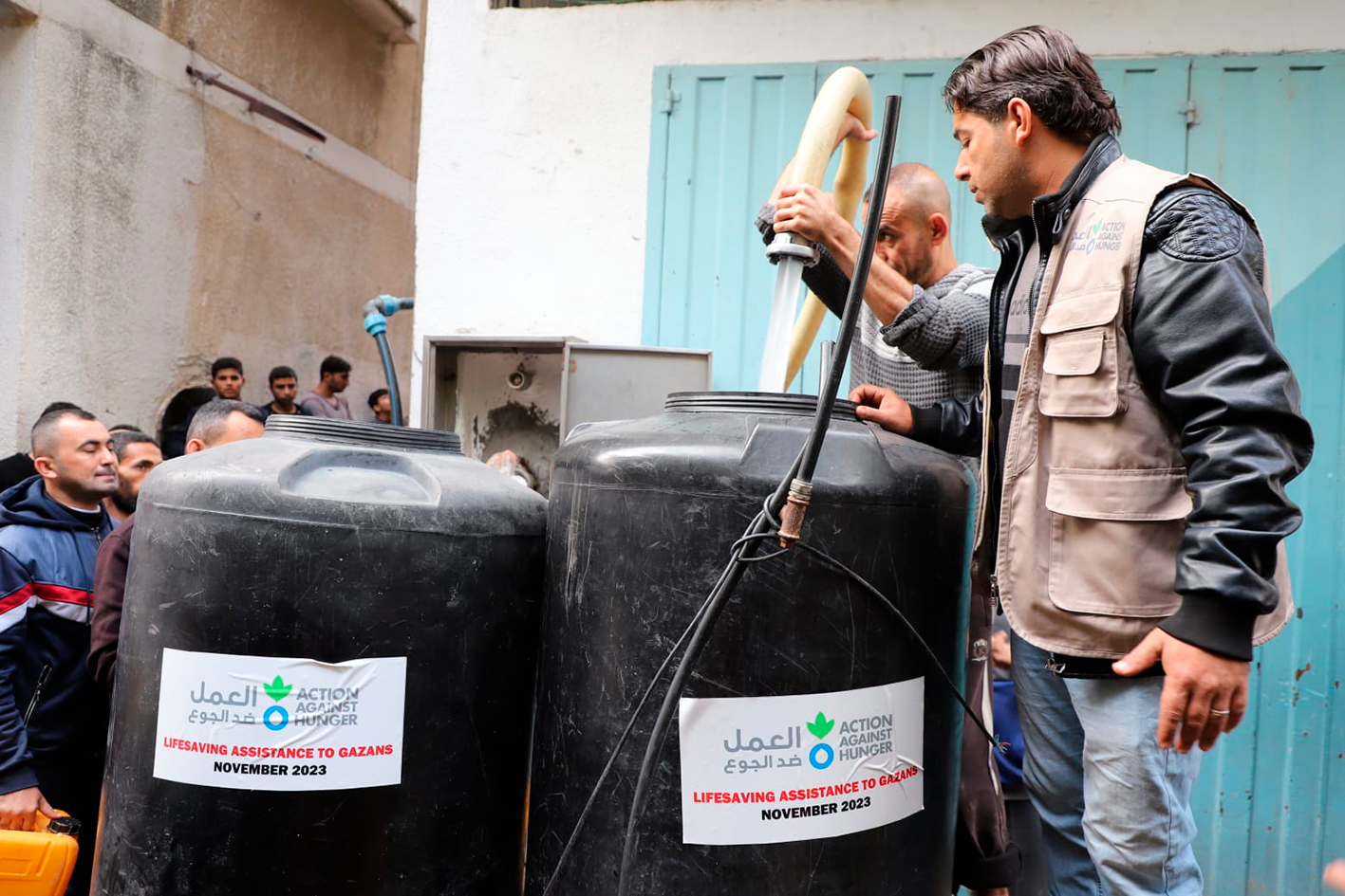 Distribución de agua potable a la población en Gaza. © Acción contra el Hambre