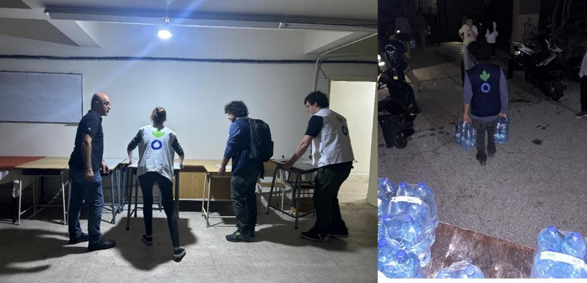 Equipos de Acción contra el Hambre preparan una escuela para que sirva de refugio para personas desplazadas en un suburbio de Beirut la noche del lunes.