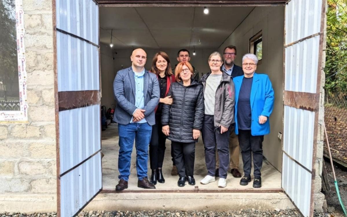 Mikheil Chkholaria (centre back) with Zugdidi LAG members and representatives of Action Against Hunger
