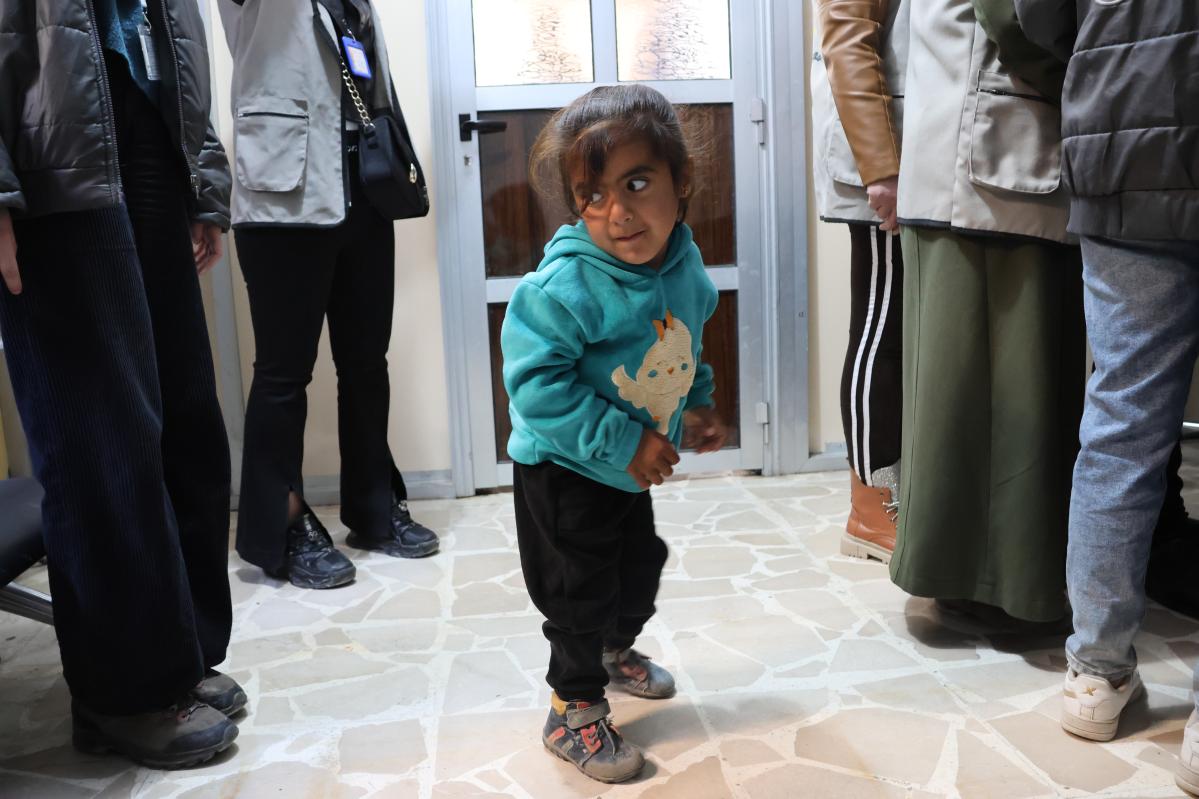 Yasmin proudly takes her steps through the crowds in the center.