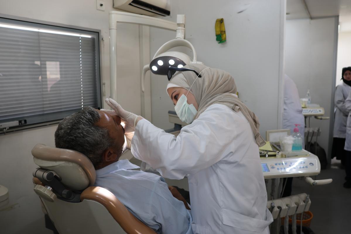 Abduljawad is receiving dental service.